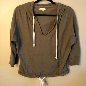 Green v-neck hoodie with tie bottom